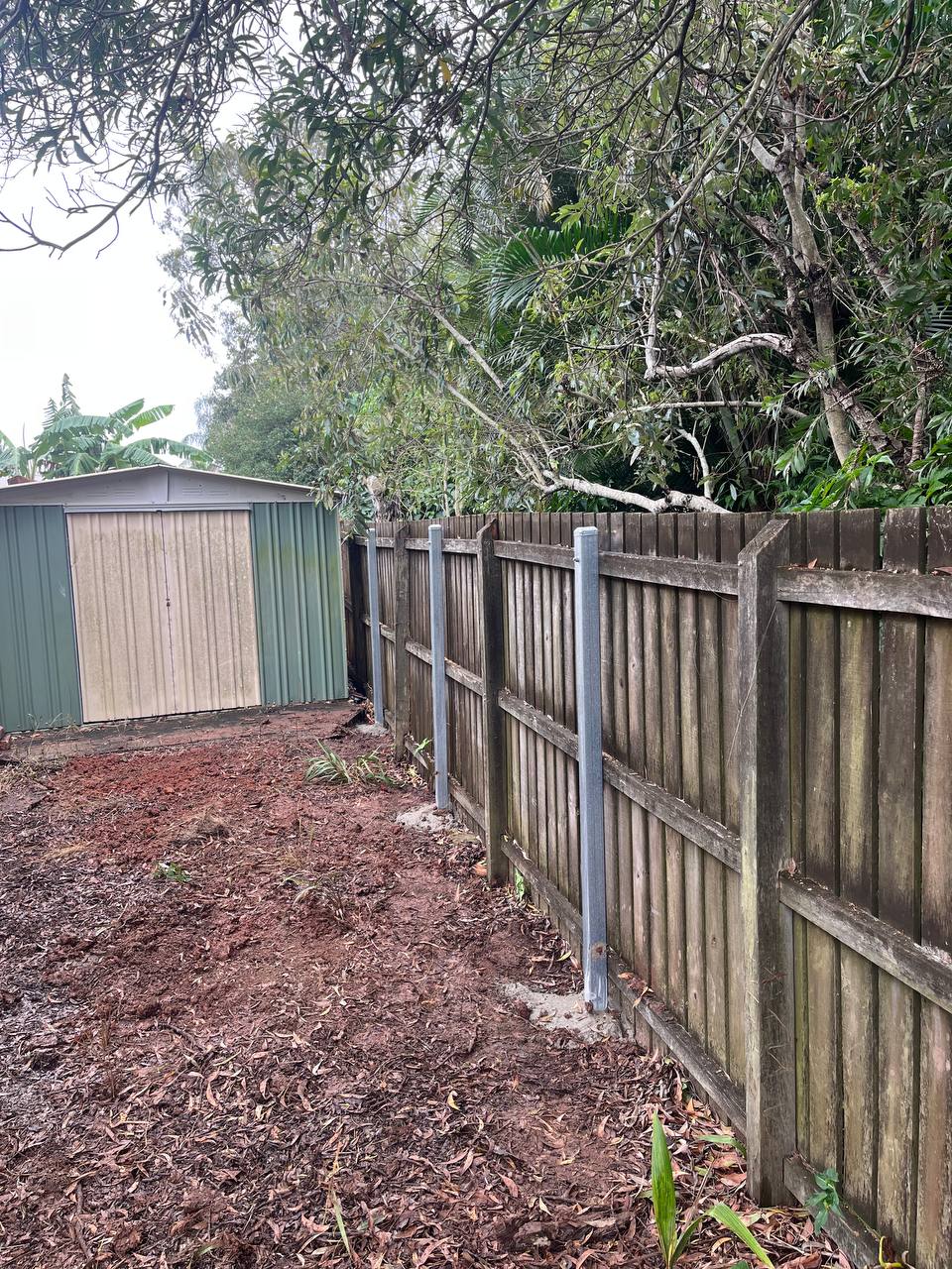 After: Straightened up fence