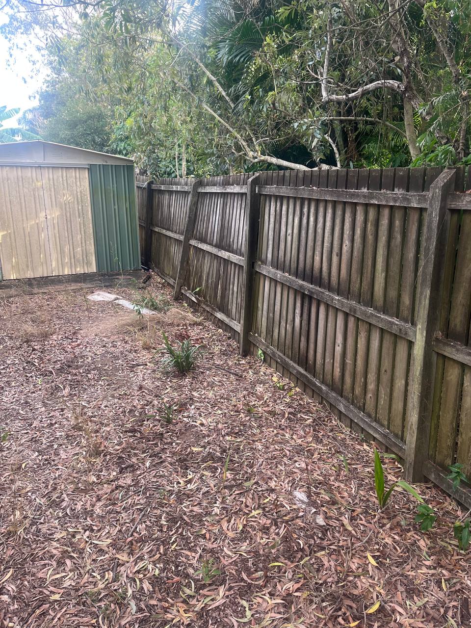 Before: Straightened up fence