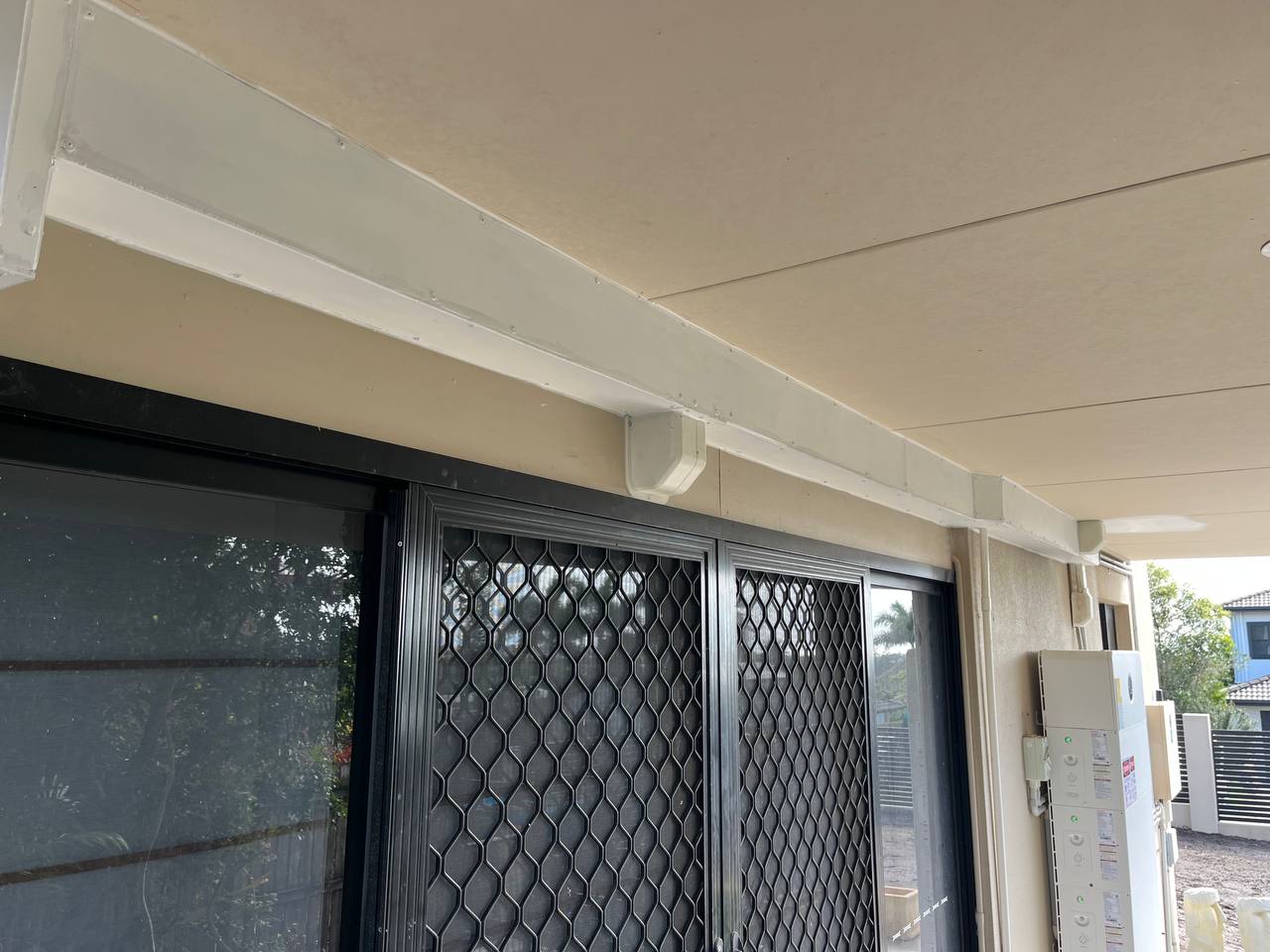 After: Cover up Aircon pipes